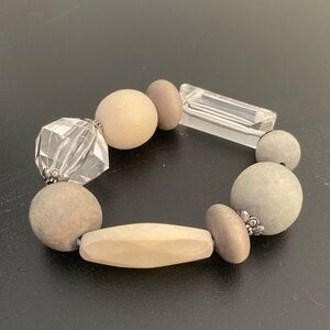 Cream colored bead bracelet.